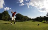Golfer Teeing Off in Okoboji Iowa
